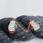 'Warm & Fuzzy' Mittens pin perfect for knitters and winter lovers. Unique enamel pin design, of two mittens attached by a chain.
