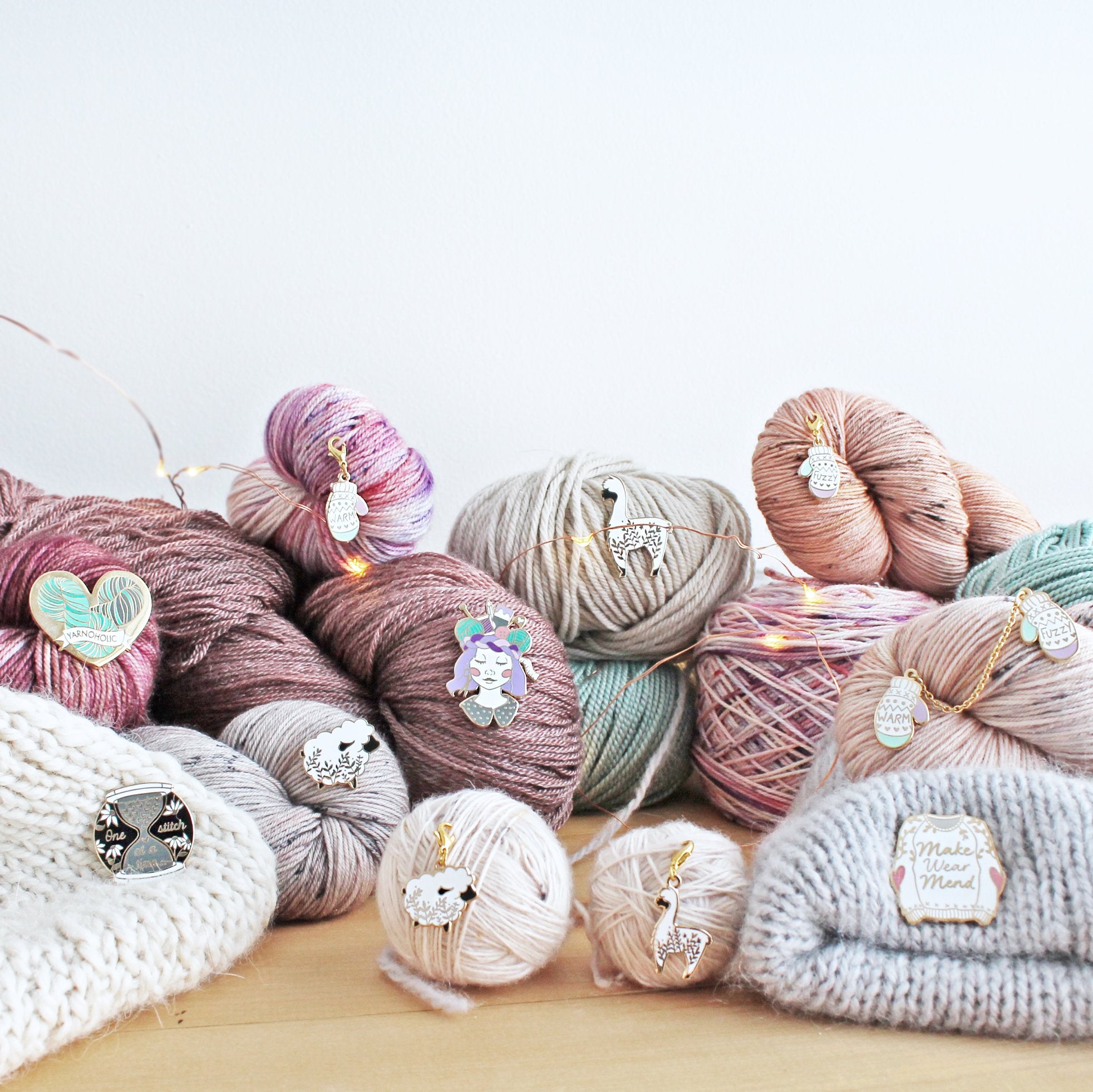 Collection of unique knitting pins and progress keepers.