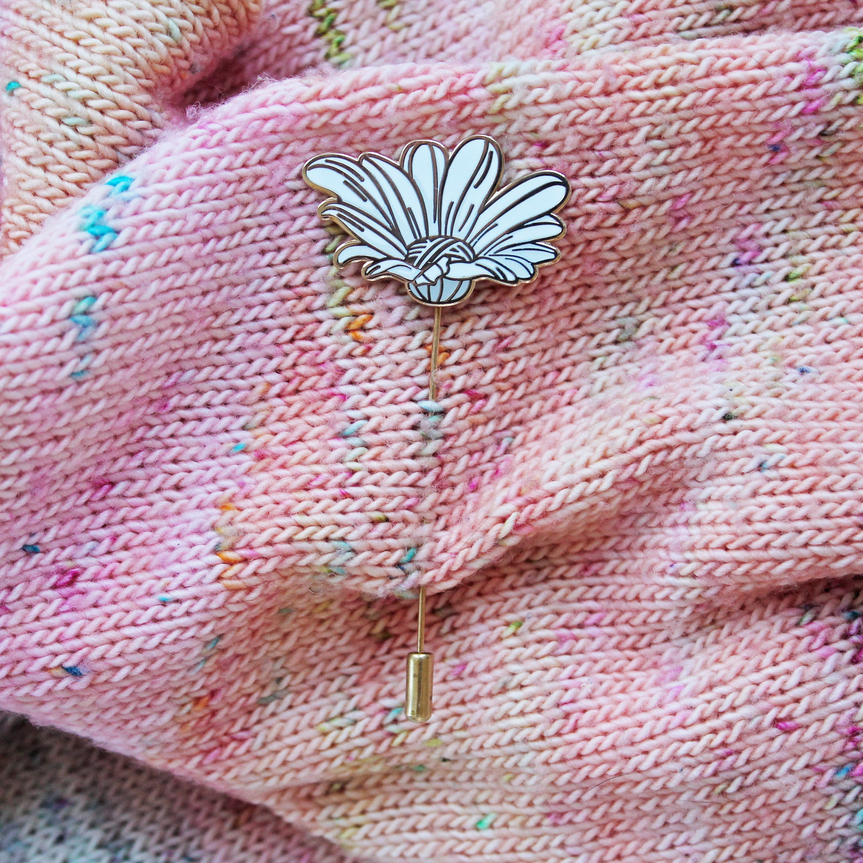 Unique floral daisy enamel shawl pin to keep your knitted garments in place. Perfect for knitted / crocheted garment styling. Can also be used as a fun twist on a classic lapel pin.