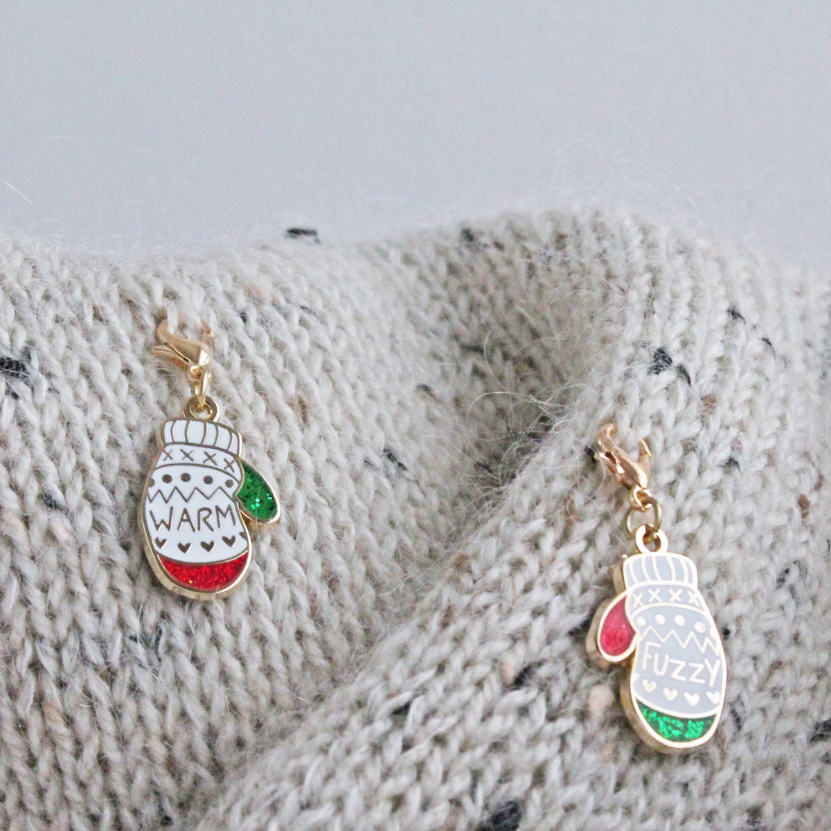 Progress Keeper Set of two 'Warm & Fuzzy' Mittens in light purple and mint. These hard enamel charms make cute and functional knitting accessories that can also be used as stitch markers