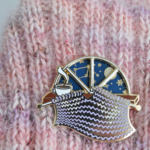 Unique spinning enamel pin for knitters. 'Day and Night' spinner knitting pin, for knitters can pass the whole day knitting. A fun knitting accessory for any project bag!